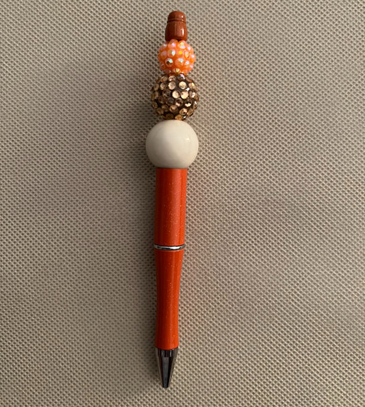 orange beaded ink pen
