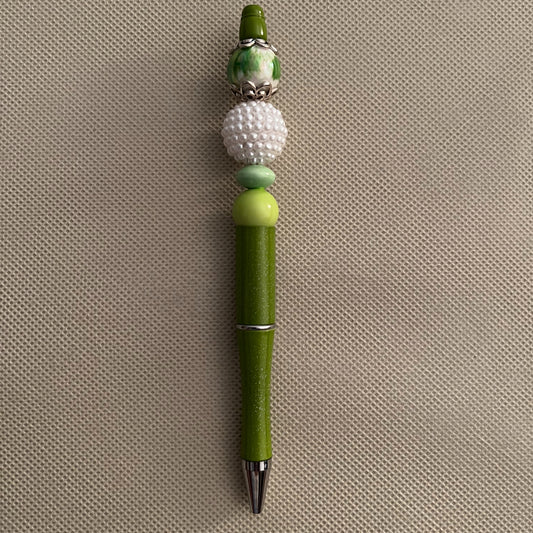 green beaded ink pen