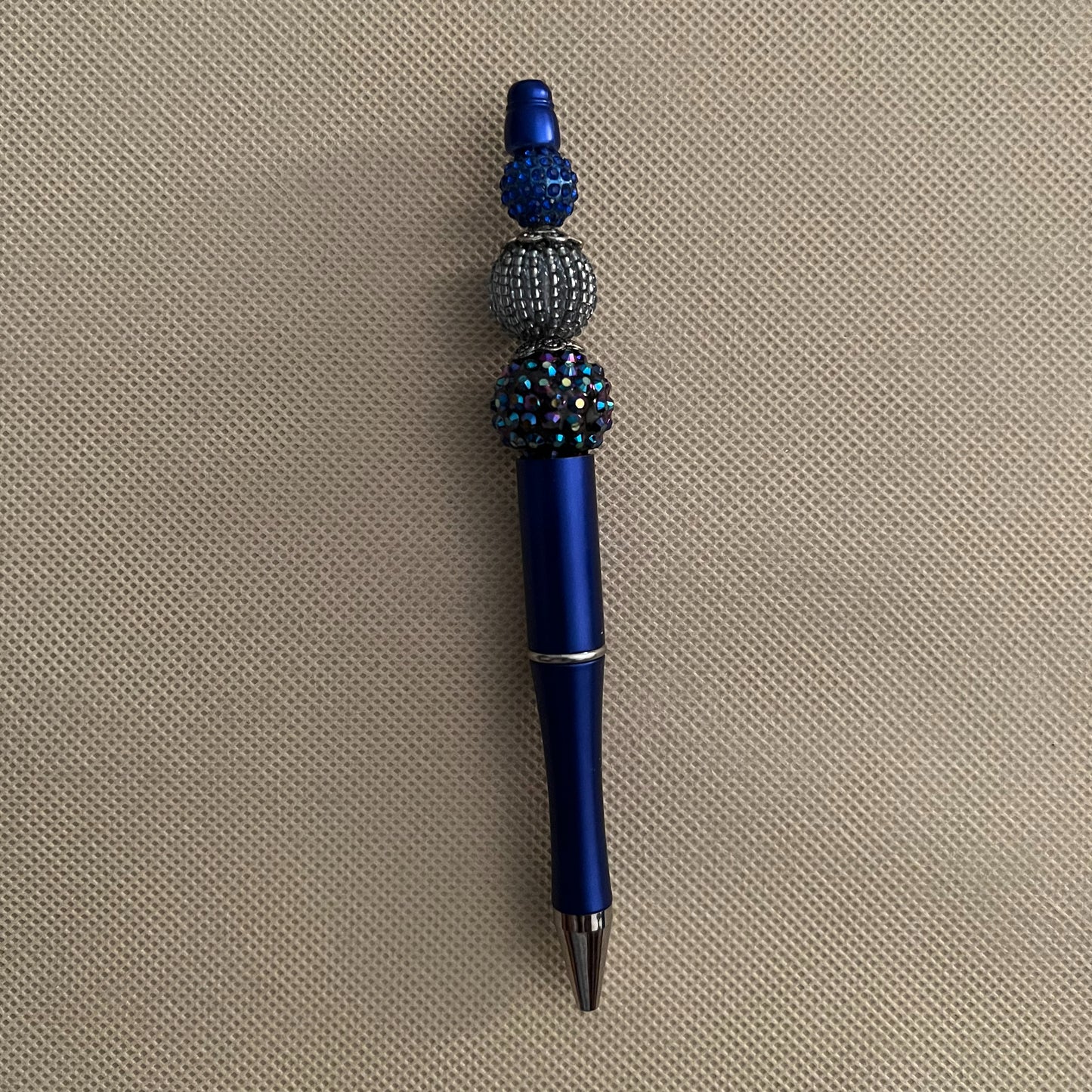 blue beaded ink pen